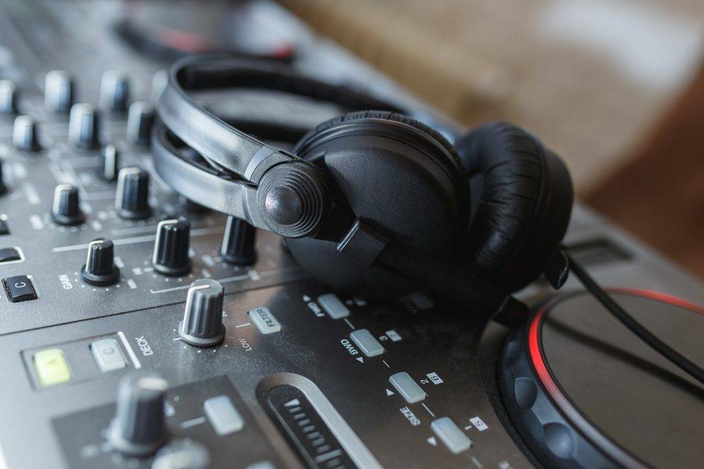 DJ Mixer with headphones.