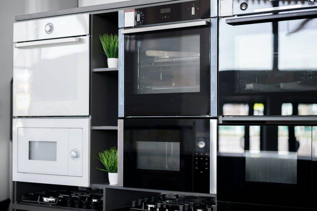 Electrical ovens, home appliances in the store